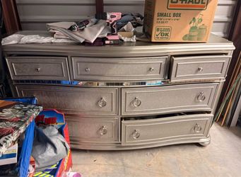 Silver Glam 9-Drawer Dresser with Mirror Trim
