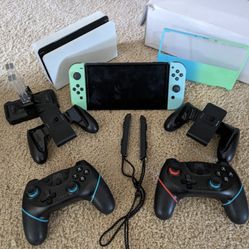 Nintendo Switch OLED With Accessories And 8 Games 
