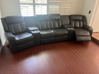 New 4 Reclining Theatre Sectional.  Grey Or Blue Gel Leatherette.  138” X 38”.  Free Delivery!