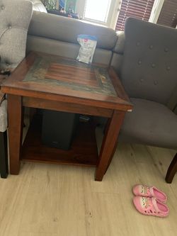 End table chips on the corner 24x24x24