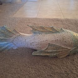 Never used it changed my colors this is grey and turquoise or green 20 inches  long and is carved wood