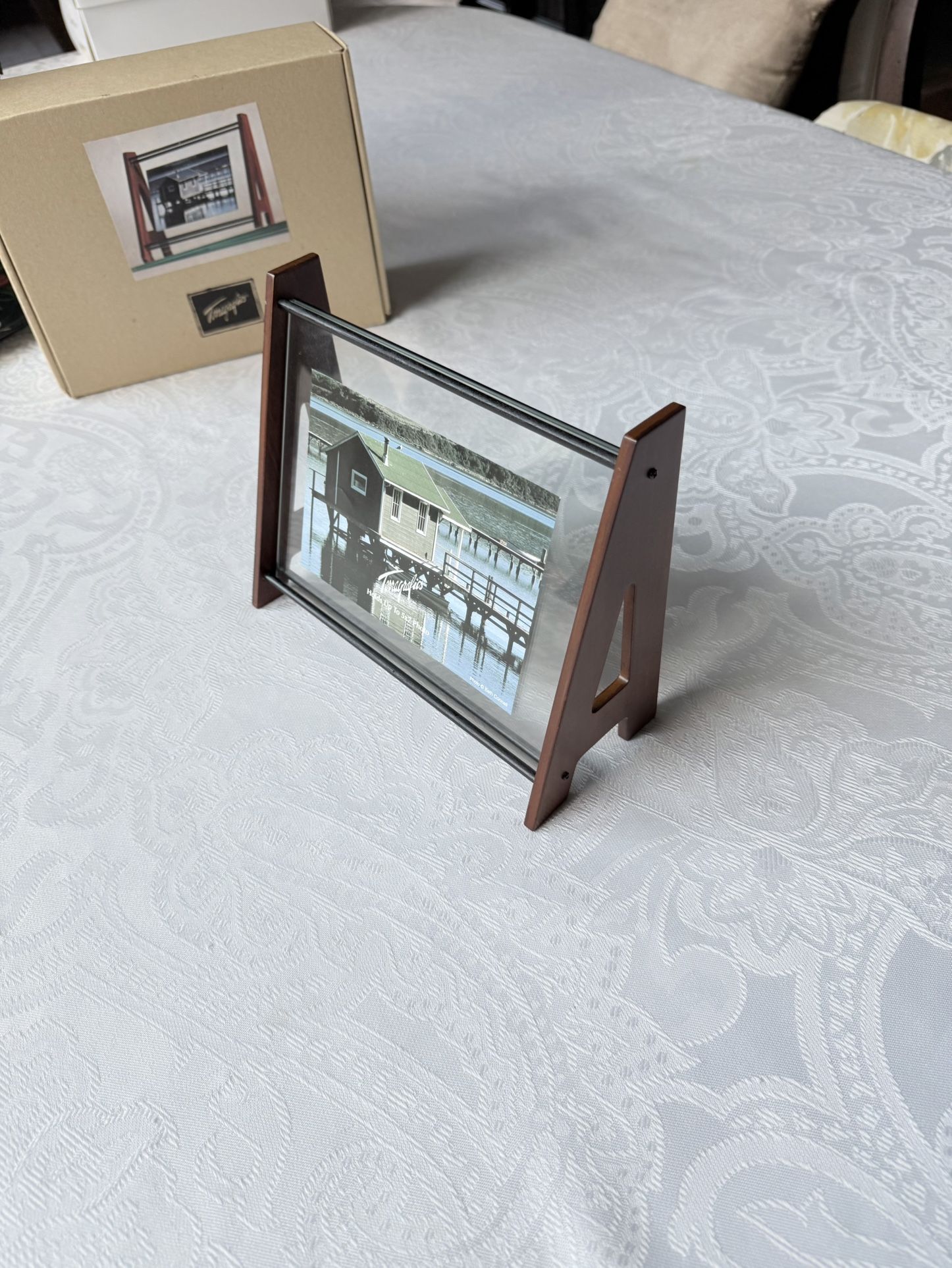 Terragrafics Vintage Antique picture frame, designed to hold a photograph or artwork between two panes of glass, supported by a wooden easel-back stan