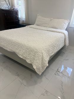 Queen Sleep Number bed with one night stand and dresser