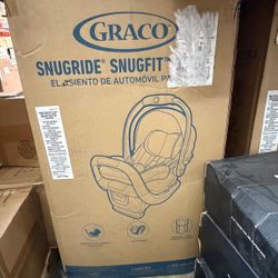 Graco Snugride Snugfit DLX Infant Car Seat 