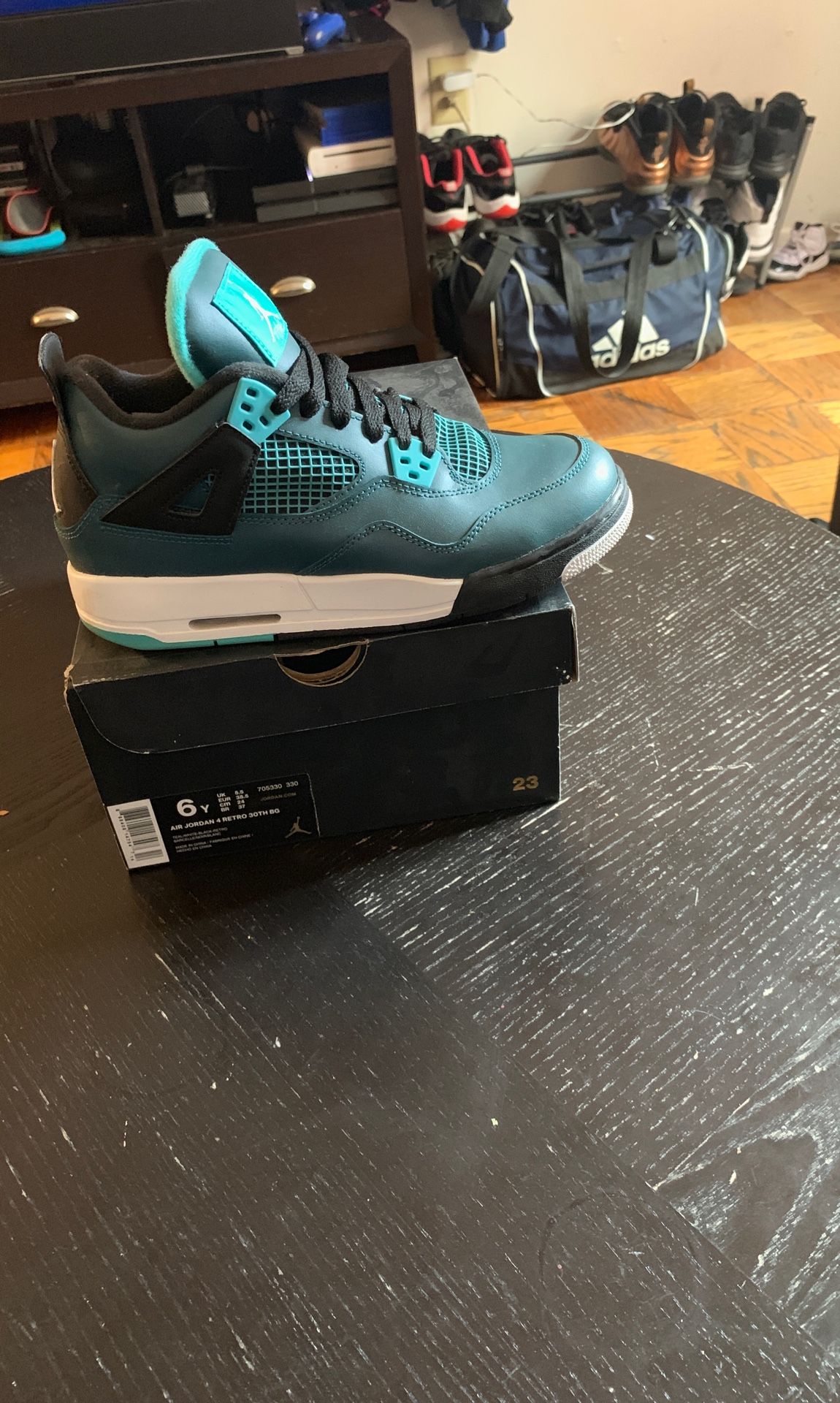 Jordan 4’s teal