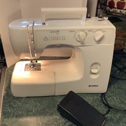 Kenmore mechanical sewing machine model 385, 51 stitch functions, manufactured by Janome for Kenmore.  Works well, foot pedal and electrical cords, ad