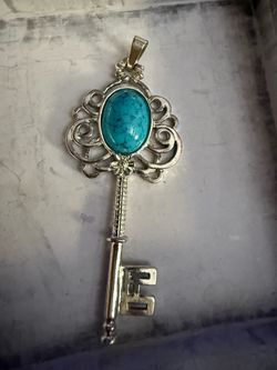 Silver Filigree Key Pendant with Turquoise Stone