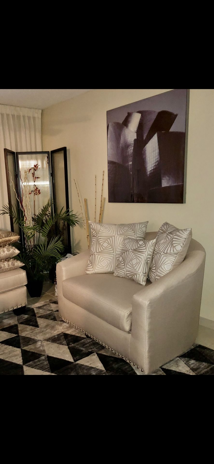 Cream color oversize swivel chair 