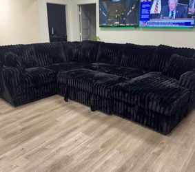 NEW IN  BOX - Black Sectional With Pull out bed and STORAGE CHAISE** Finance Available $54 down