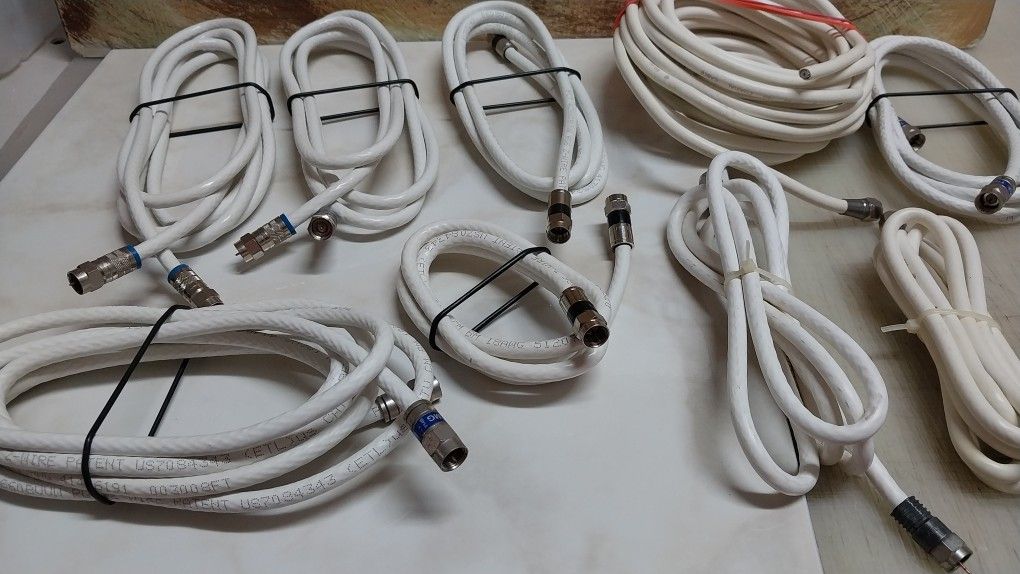 Seven White Coax Cables As Shown