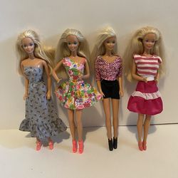 Four Vintage Barbie Dolls, Made in Malaysia