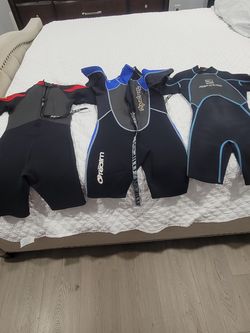 Some water suits for surfing and swimming.