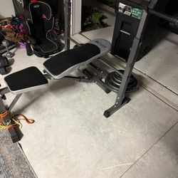 Workout Bench With Barbell And Plates