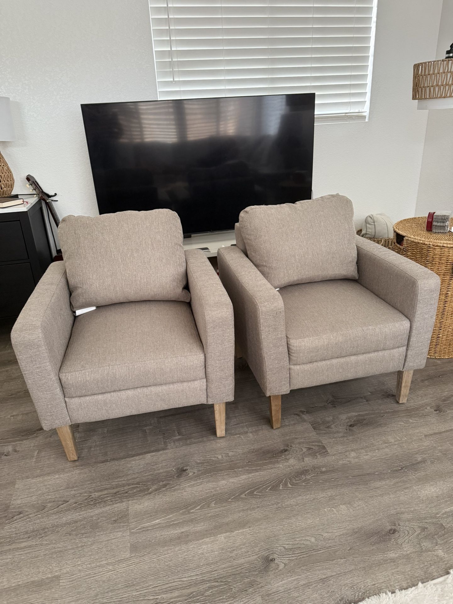 Deep couches with limited space for end tables and wall art