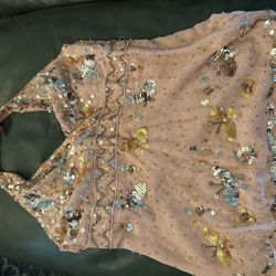 Bebe Pink sequin top with gold sequin butterfly embellishments and halter neck; side zipper