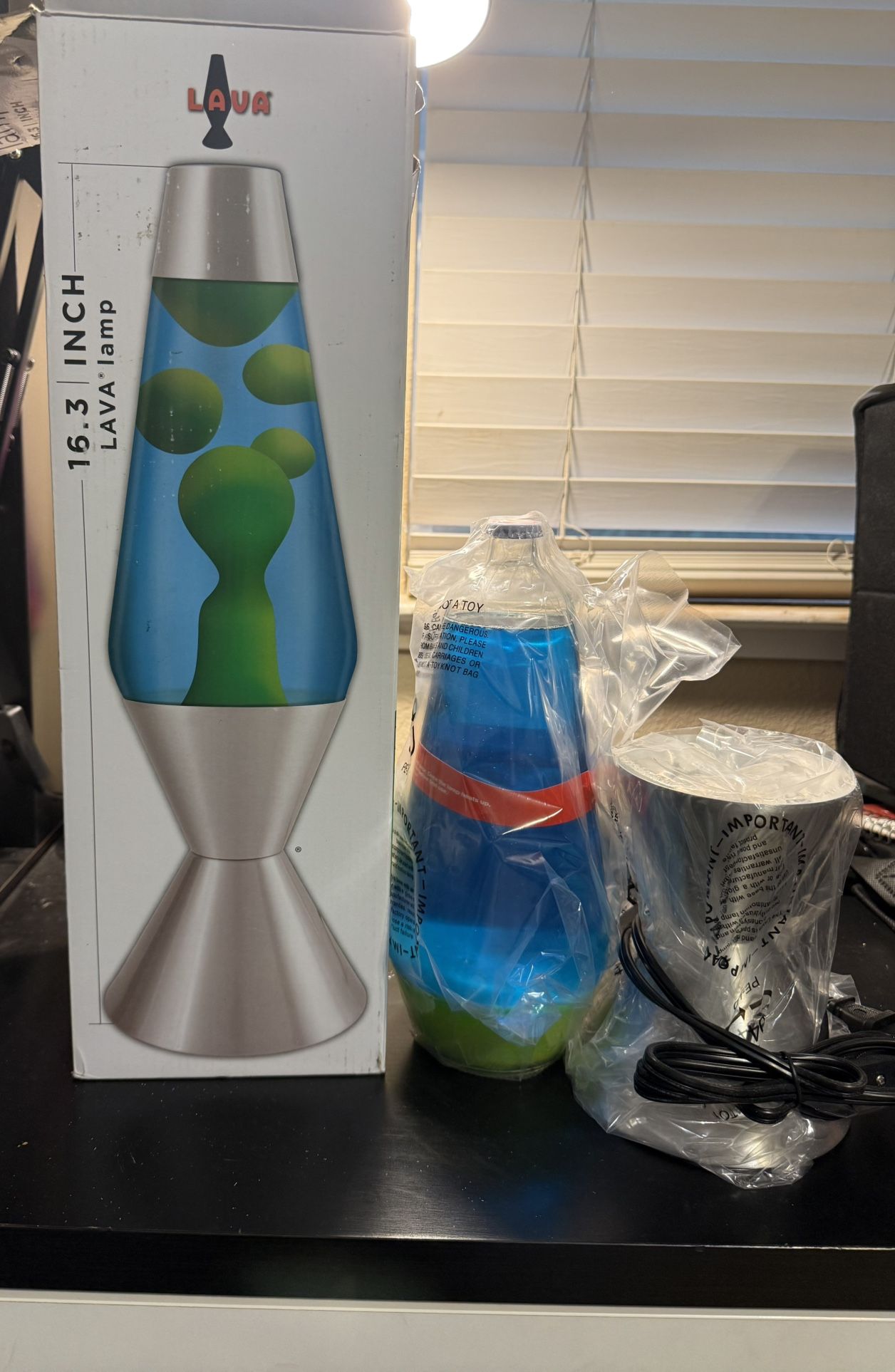 Lava Lamp 16.3 Silver Base New  50. Asking 25. 