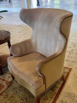 Tan wingback chairs (x4)