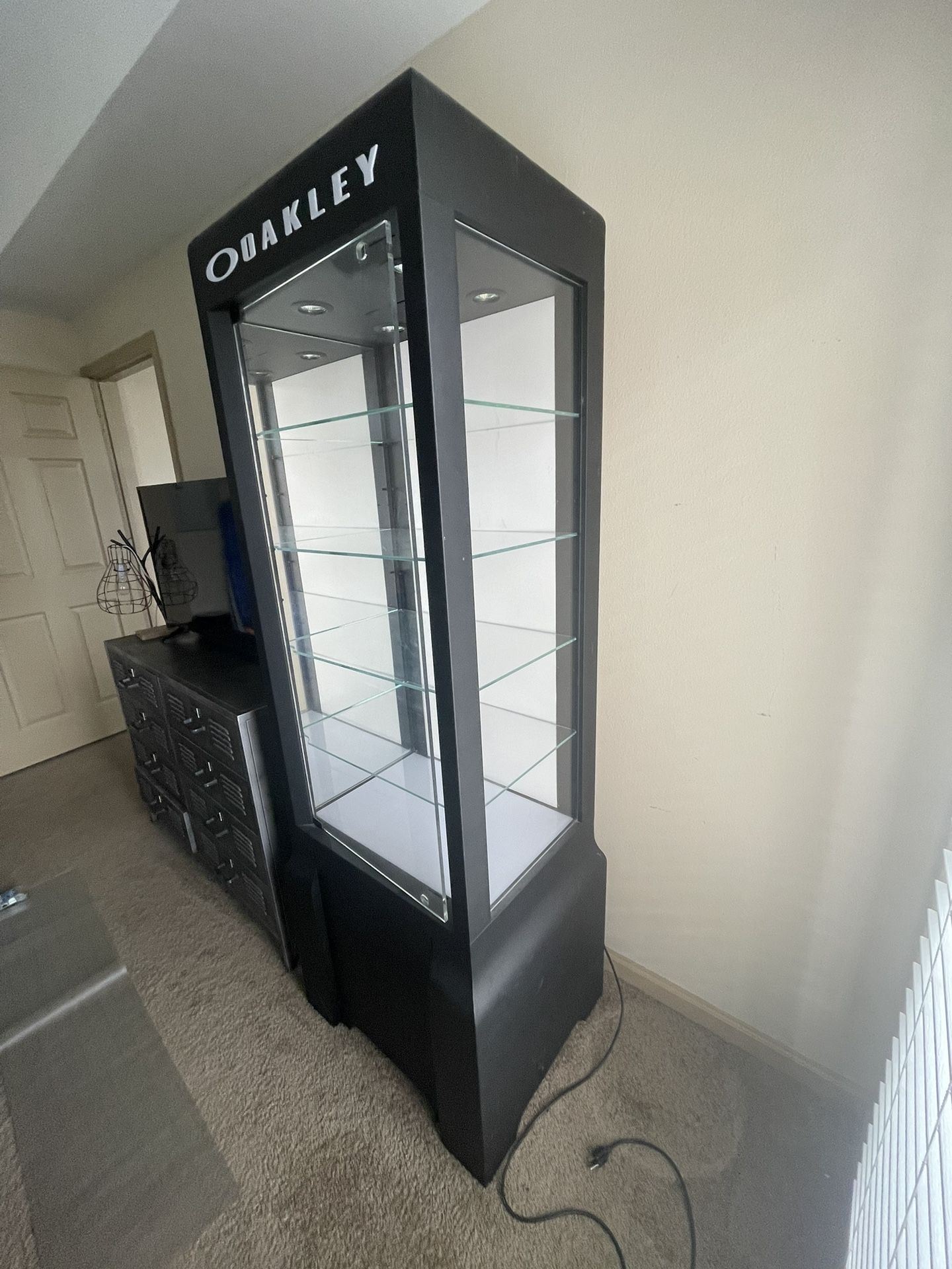 Oakley Display Case w/ Lights and Lockable Storage.