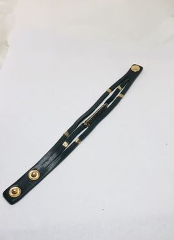 Sheng Tung genuine grey leather wristband bracelet with gold tone accent and gold tone center piece with black stones