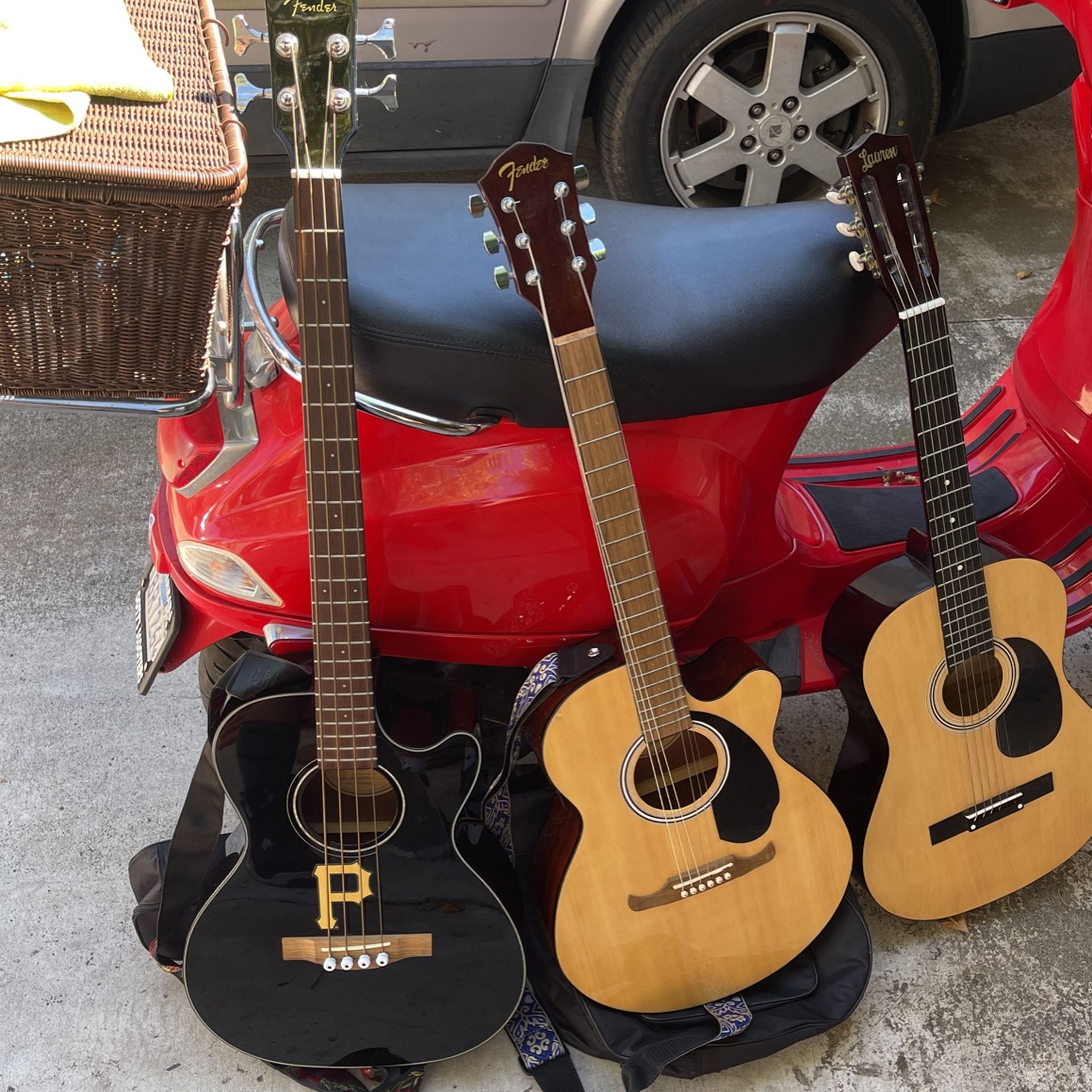 Acoustic Bass Guitar, And Two Normal Guitars