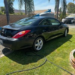 2006 Toyota Solara (2-door) with a V6 engine, about 200,000 miles,