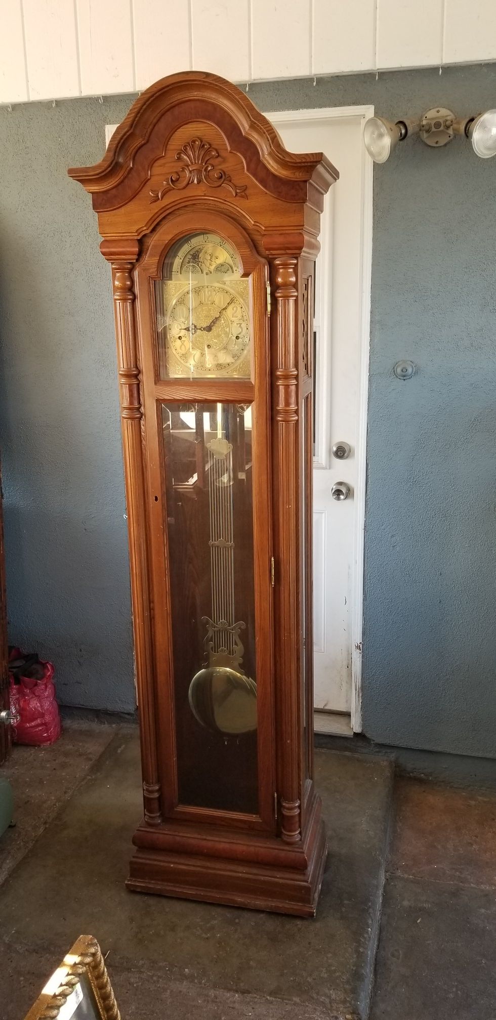 Pearl grandfather clock first 75.00 owns it!