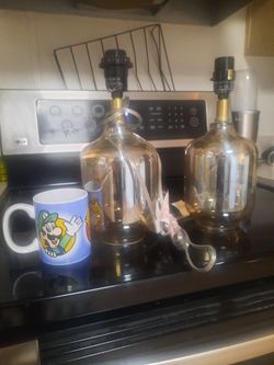 2 Lamps  (Iridescent ) NEVER USED. Make Offer 