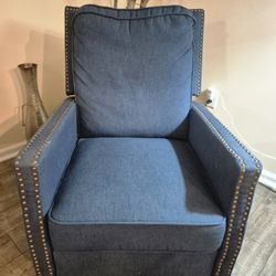Beautiful blue armchair with studded accents