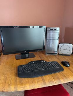 HP Pavilion 8 Gb Ram, 1.5 Tb Drive, DVD Burner, 23” LED Monitor, Wireless Mouse & Keyboard plus External Seagate Hard Drive