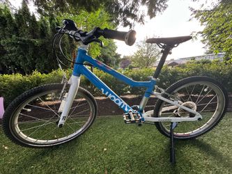 Woom 4 20 inch bike -$300
