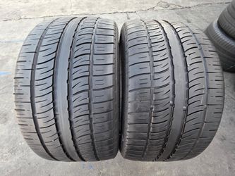 2 USED TIRES PIRELLI 285/35/22