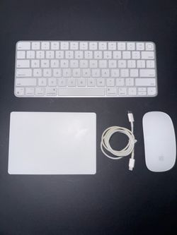 Apple White Bluethooth Keyboard Mouse, and cds