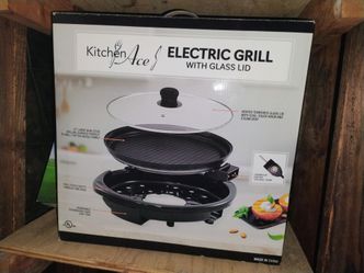 Electric grill with glass lid