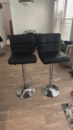 Two black barstools
