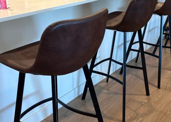 4 faux leather brown bar stools