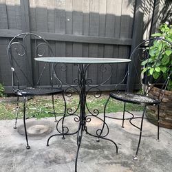 Vintage Originals. 2 Chairs And Bistro Table. Excellent Condition Just Need To Paint Black Or Go Back To Original White.