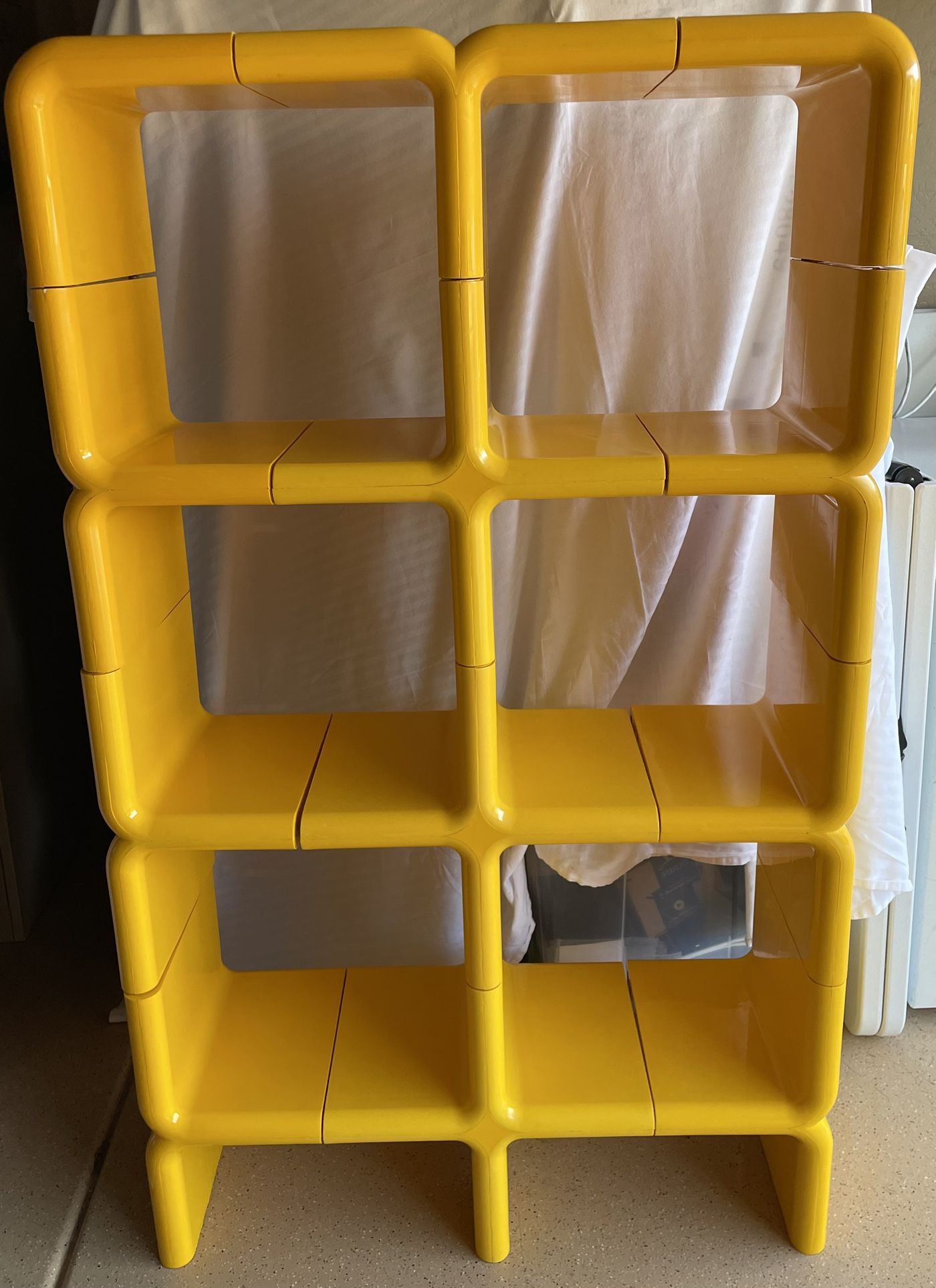 Modern Furniture.UMBO ABS plastic molded shelving designed by K Leroy