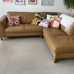 Natuzzi brown leather couch from Bloomingdales