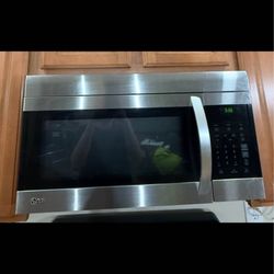 NEED GONE TODAY!! - LG Microwave - over the counter. Nothing wrong