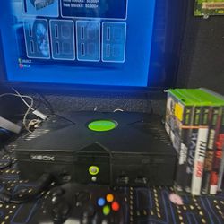 Xbox original with a few games