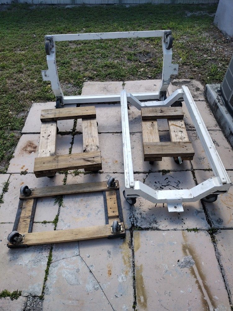 (2) Aluminum Boat Dollys And 3 Wood Dollys