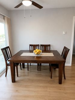 Dark Wood Dining Table with 4 Chairs