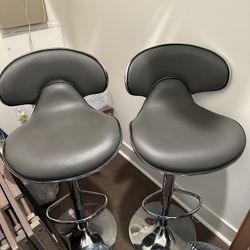 2 Gray And Silver Bar Stools