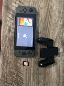 Nintendo Switch with Smash Bros Game + Accessorie