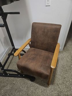 Brown faux leather chair