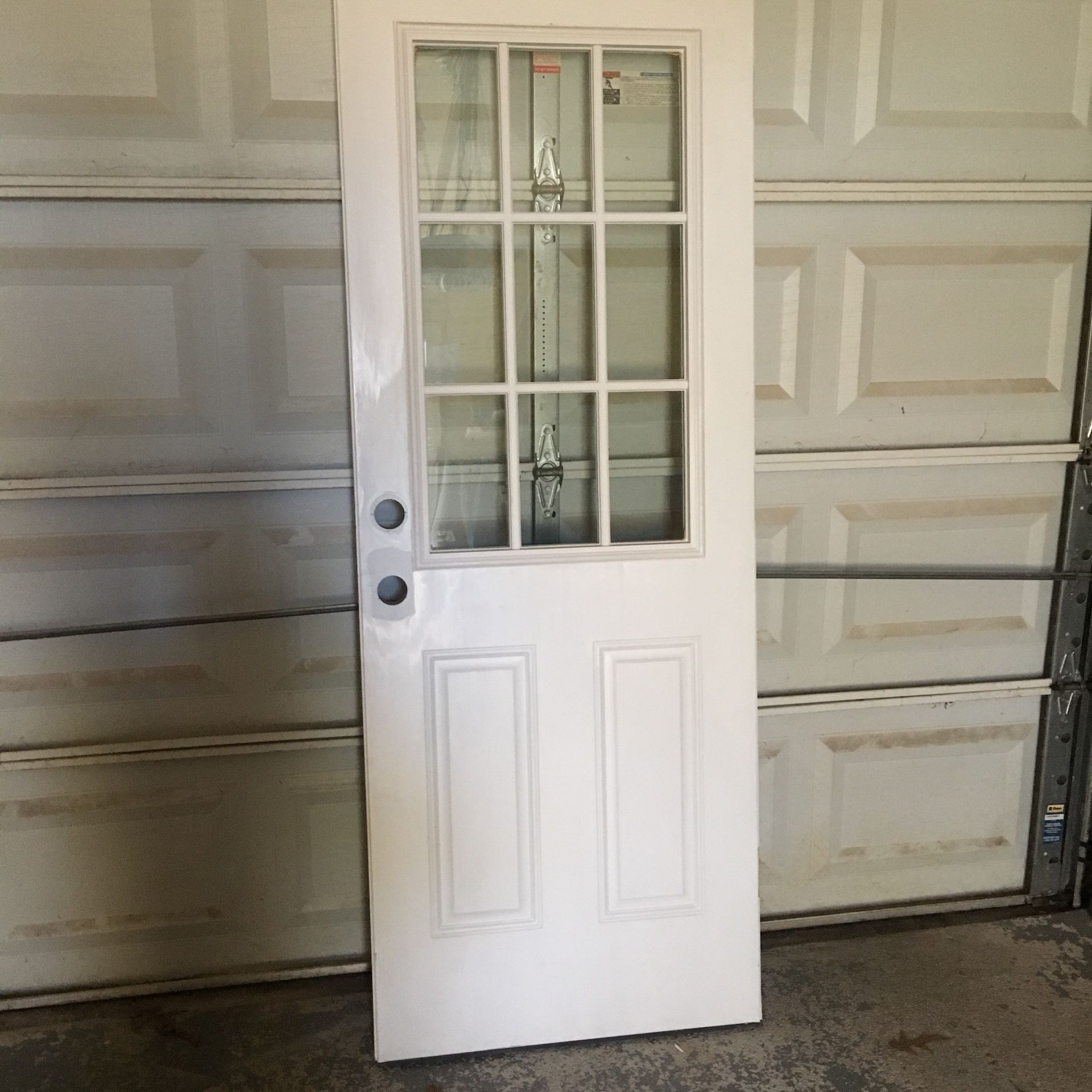 30 inch left exterior steel door, with the frame in excellent condition