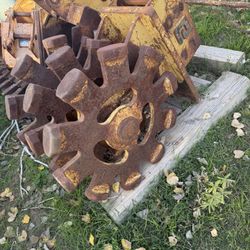  Backhoe Buckets And A Compaction Wheele