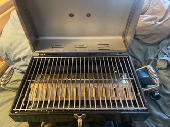 Like new. Portable propane grill