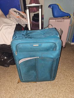 Samsonite dark green suitcase