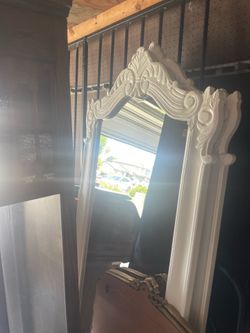 Two full length wall mirrors. Approximately 30” wide by 72” tall. Solid wood frame. $75 each or both for $100.